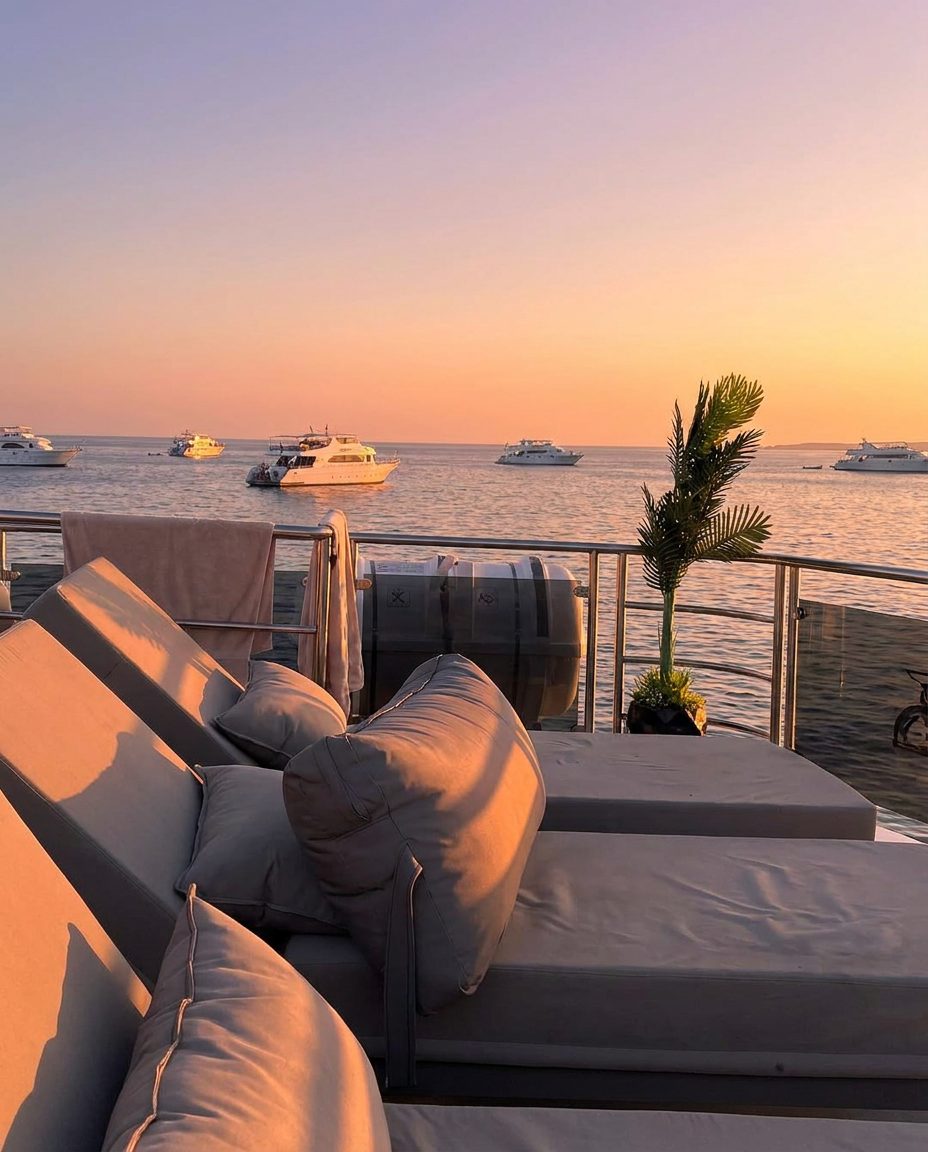 A relaxed deck lounge at sunset as guests settle in for the first evening